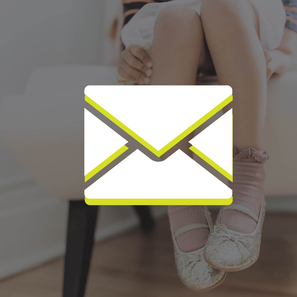 little girl wearing cute shoes with email icon